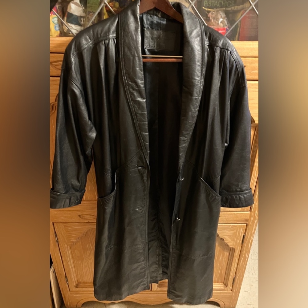Full length leather coat for ladies small to medium size.